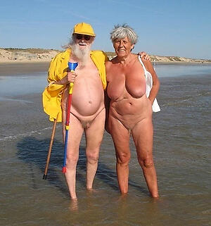 a granny at beach shows us her sexy naked flock