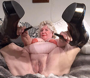 granny in heels poses naked