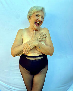 granny in pantyhose poses topless