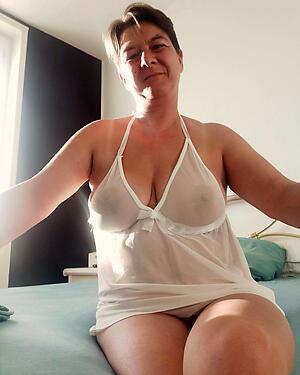 photoshooting with sexy Norwegian older woman lingerie