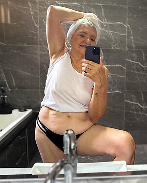 bald granny selfshot poses