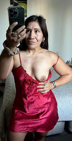 sexy latina granny poses unclad