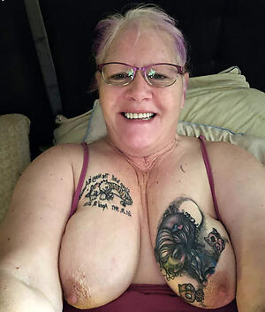 pic with naked older wife with tattoos