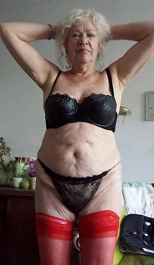 American very old nude woman poses
